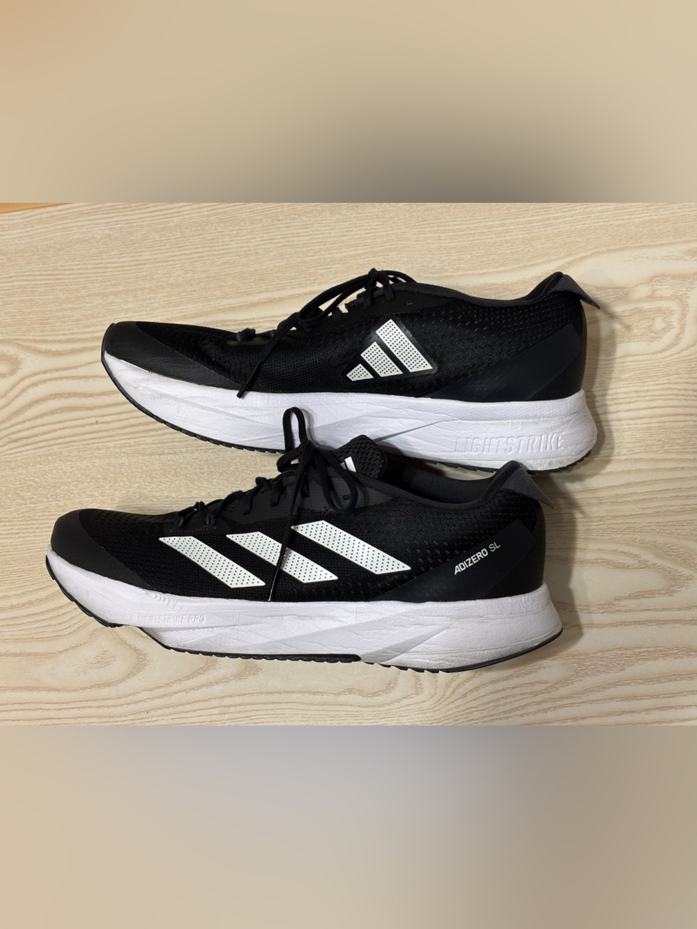 adidas Men’s Black & White Adizero SL Running Shoes